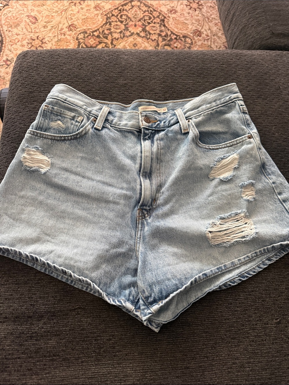 Levi’s High-Rise Light Blue Distressed Denim Mom Shorts